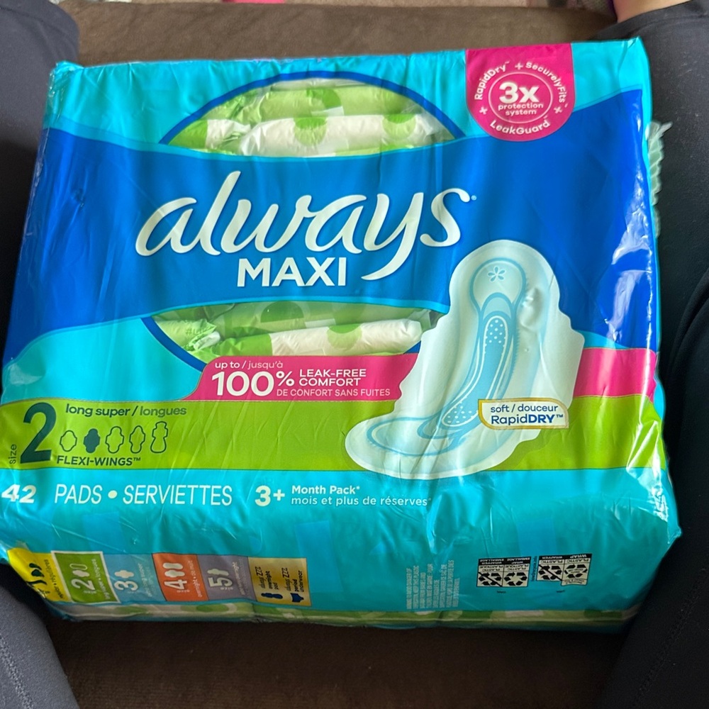 Always Maxi Pads - Vibrant Blue and Green Packaging